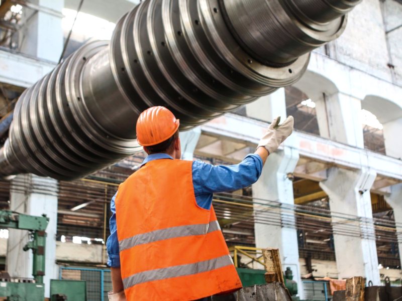 Construction supervisor inspecting steelwork on site