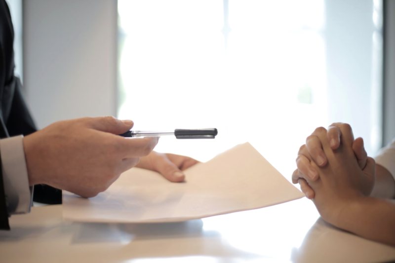 A client meeting in progress at the Bluewings Consultancy office